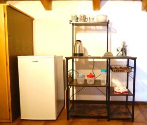 Kuchyň nebo kuchyňský kout v ubytování Cozy rooms + 3 fotografie
