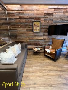 TV a/nebo společenská místnost v ubytování Alpenburg Bergparadies Apartments