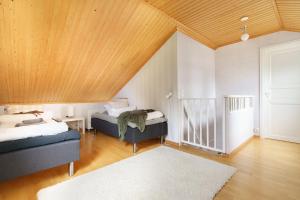 Postel nebo postele na pokoji v ubytování Polar River Villa