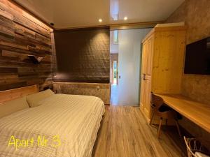 Postel nebo postele na pokoji v ubytování Alpenburg Bergparadies Apartments