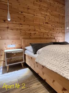 Postel nebo postele na pokoji v ubytování Alpenburg Bergparadies Apartments