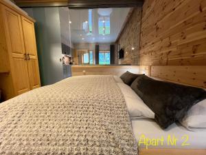 Postel nebo postele na pokoji v ubytování Alpenburg Bergparadies Apartments