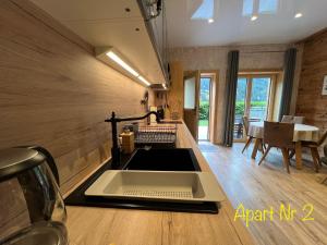 Kuchyň nebo kuchyňský kout v ubytování Alpenburg Bergparadies Apartments