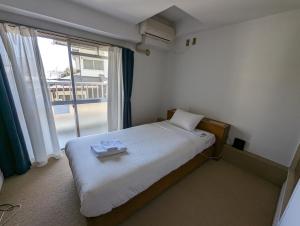 Hotel WWJ客房内的一张或多张床位