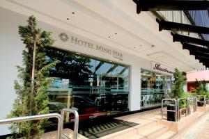 a store front with a large glass window at Hotel Ming Star in Kuala Terengganu