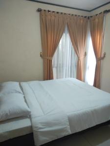 Postel nebo postele na pokoji v ubytování Villa Viva Mezzanine - Family