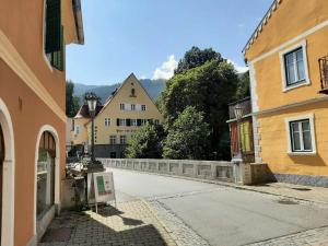 an empty street in a town with buildings at Haus Peter in Murau