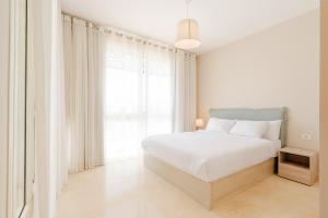 Boutique Residence Mangroovy-Lemon Spaces Gouna客房内的一张或多张床位