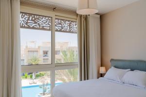 Boutique Residence Mangroovy-Lemon Spaces Gouna客房内的一张或多张床位