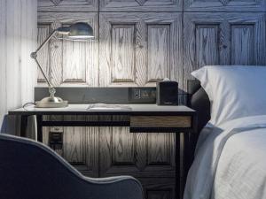 Voodi või voodid majutusasutuse Tango Inn Taipei Jihe toas