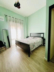 Postel nebo postele na pokoji v ubytování Sorti GuestHouse