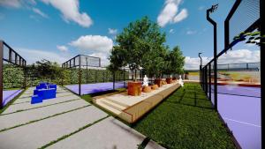 a rendering of a tennis court with a tennis court at Chrysomare Beach Hotel & Resort in Ayia Napa