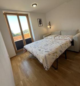 Postel nebo postele na pokoji v ubytování Slunečný apartmán