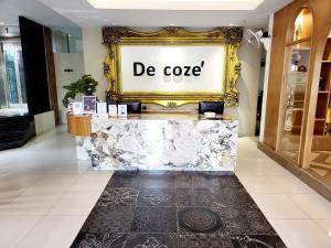 Certifikát, hodnocení, plakát nebo jiný dokument vystavený v ubytování De Cozé Hotel