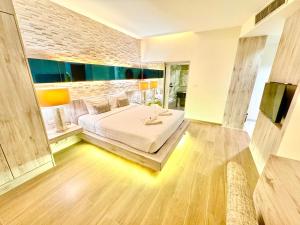 Postel nebo postele na pokoji v ubytování De Cozé Hotel