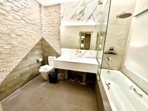 Koupelna v ubytování De Cozé Hotel