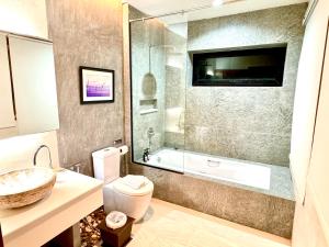 Koupelna v ubytování De Cozé Hotel
