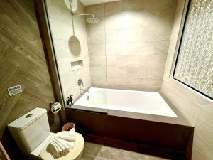 Koupelna v ubytování De Cozé Hotel