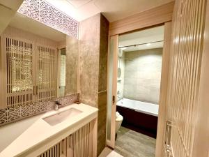 Koupelna v ubytování De Cozé Hotel