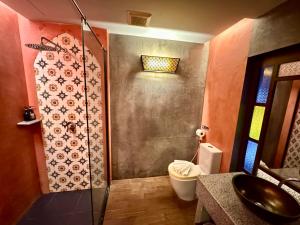 Koupelna v ubytování De Cozé Hotel
