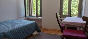 Postel nebo postele na pokoji v ubytování Vagia's Home
