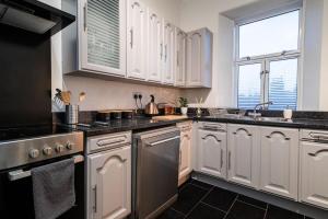 Η κουζίνα ή μικρή κουζίνα στο Strathbogie Apartment Huntly