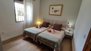 Postel nebo postele na pokoji v ubytování Villa Aljara + 35 fotografií