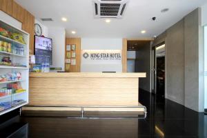 a restaurant with a cash counter in a store at Hotel Ming Star in Kuala Terengganu