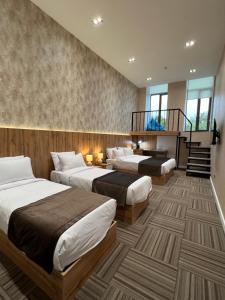 Кровать или кровати в номере Ferma Art hotel boutique