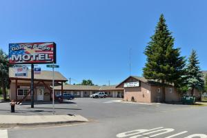 a restaurant with a sign on the side of the street at Golden Eagle Motel in Dorris