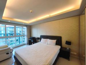 City garden ,soi buakhaw客房内的一张或多张床位