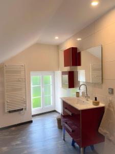 a kitchen with a sink and a counter top at Gîte du Riou in Bué +7 photos