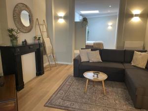 Posezení v ubytování Hotel Au Quartier