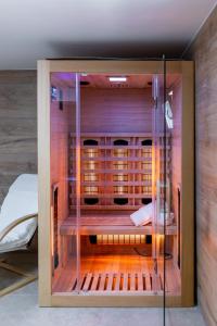 a small cage in a room with a bed at Villa Ema in Bilje +106 photos