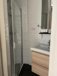 Koupelna v ubytování Hotel Au Quartier