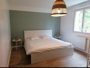 Postel nebo postele na pokoji v ubytování La villa de Sofie