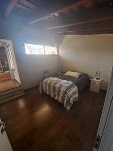 Ένα ή περισσότερα κρεβάτια σε δωμάτιο στο La Casa de Bimba