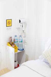 TRANSIT Donmueang Airport HOSTEL客房内的一张或多张床位