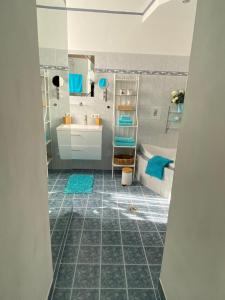 Kopalnica v nastanitvi Apartment mit Sauna im Wienerwald - Mödling