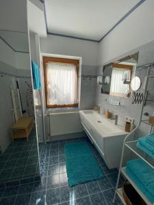 Kopalnica v nastanitvi Apartment mit Sauna im Wienerwald - Mödling