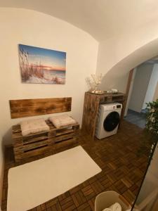 Predel za sedenje v nastanitvi Apartment mit Sauna im Wienerwald - Mödling