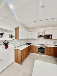 Η κουζίνα ή μικρή κουζίνα στο New, ultra comfy, central flat