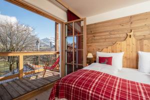 Кровать или кровати в номере Kitzhof Mountain Design Resort