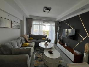 Posezení v ubytování Aurora smart Homes City Oasis Gardens