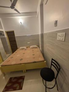 Bimala Hotel客房内的一张或多张床位