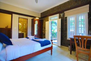 Voodi või voodid majutusasutuse Chithirapuram Palace toas