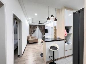 TV a/nebo společenská místnost v ubytování Homestay Abg Ipar
