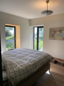 Postel nebo postele na pokoji v ubytování Loft en Mar