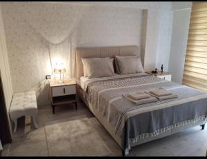 Postel nebo postele na pokoji v ubytování Eryaman, Wide Luxury Rezidance