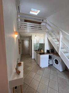 Et tv og/eller underholdning på L'Ermitage les Bains - Duplex TiCocon + 7 billeder